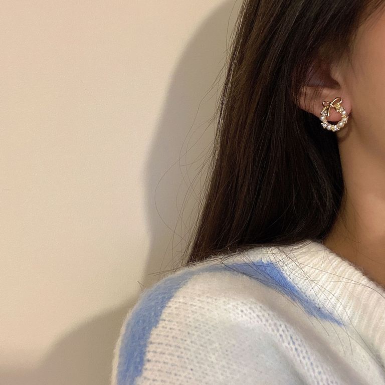 Dainty Knot Stud Earrings in Gold Tone
