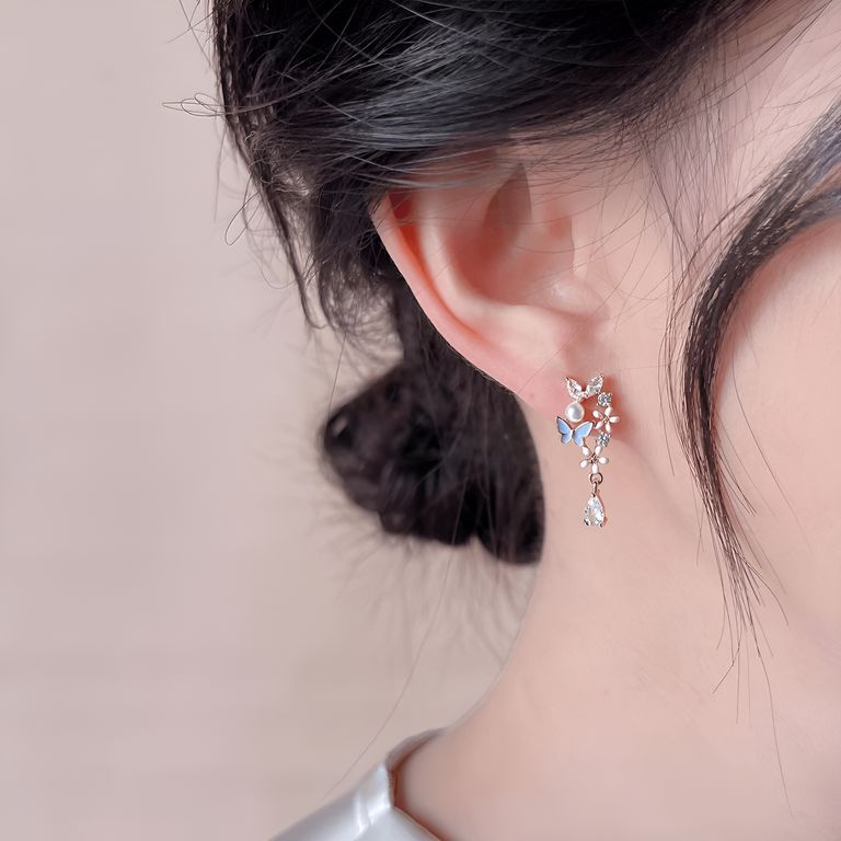 Mini Blue Butterfly Drop Earrings in Gold Tone