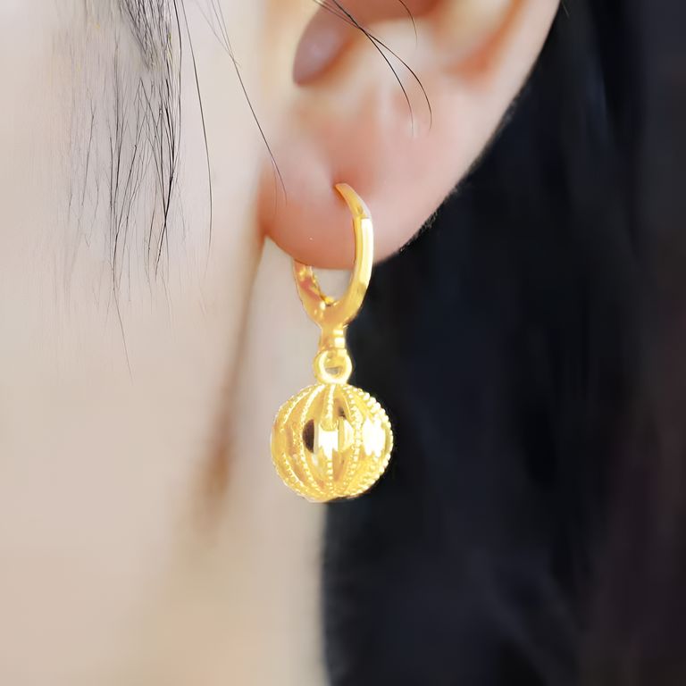Shimmering Ball Drop Huggie Earrings in Gold Tone