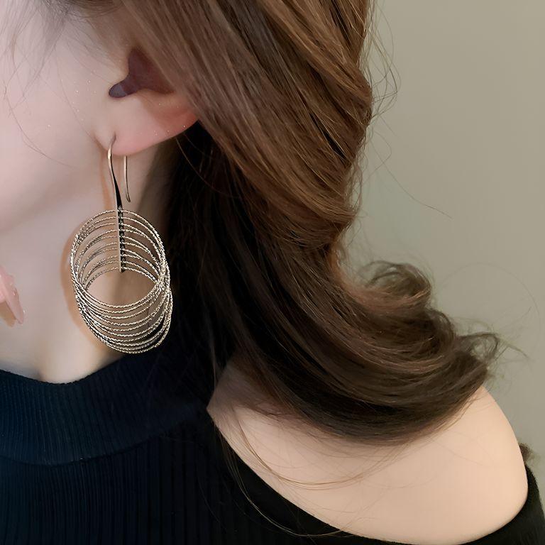 Spiral Radiance Drop Earrings in Silver Tone