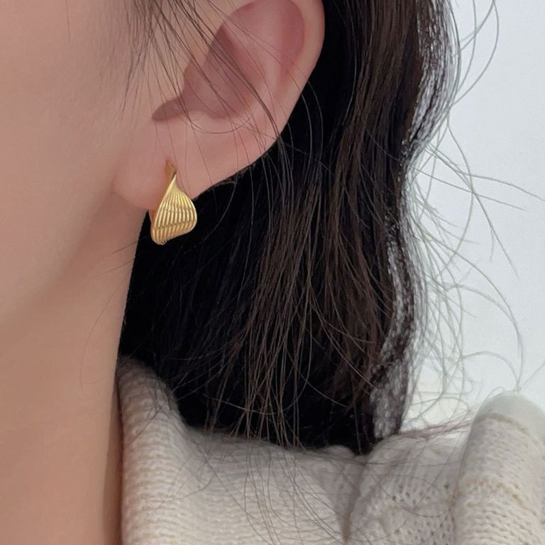 Wavy Huggie Earrings in Gold Tone